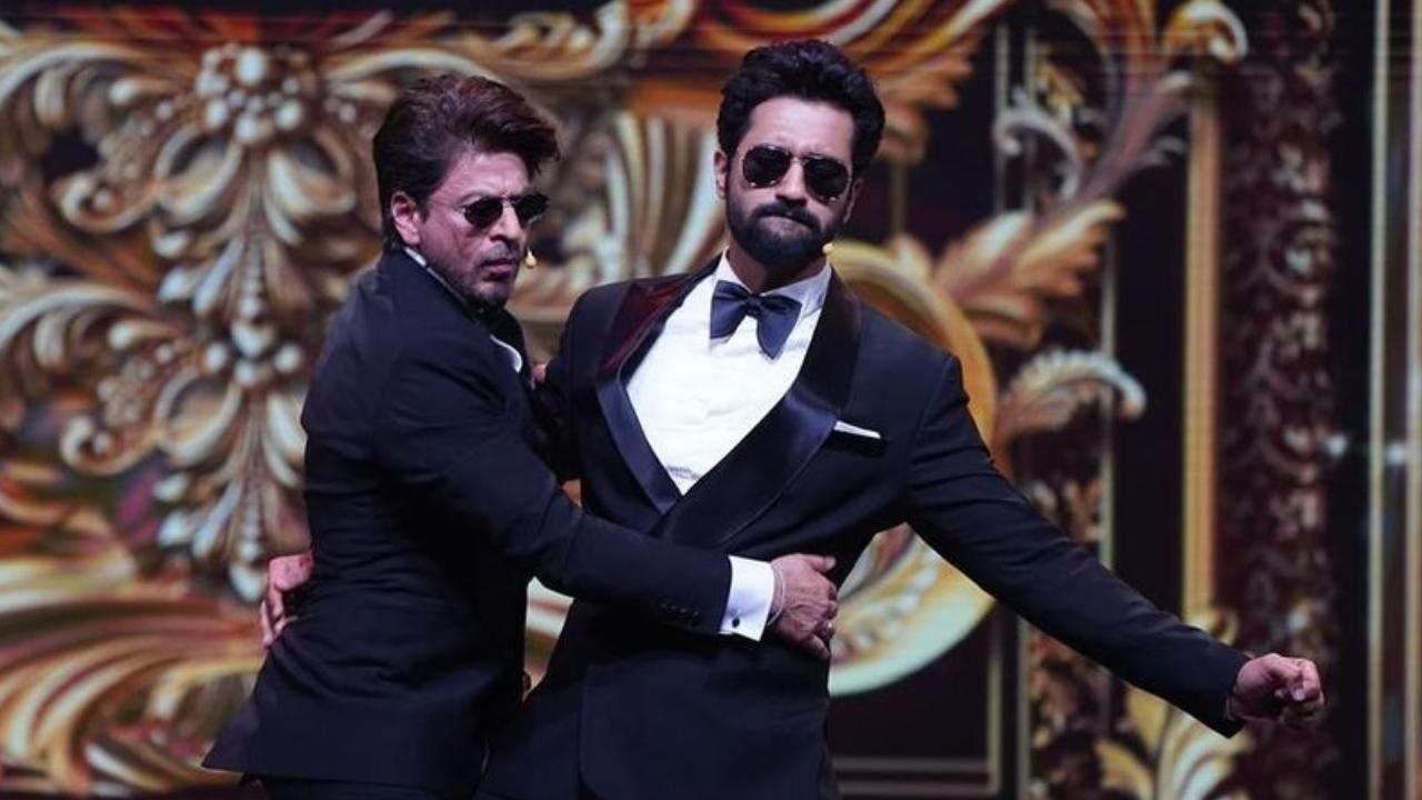 When Vicky Kaushal turned up on stage as co-host during the night, Shah Rukh Khan engaged in some dance with him. The two were seen dancing to the viral 'Tauba Tauba' song. Read More