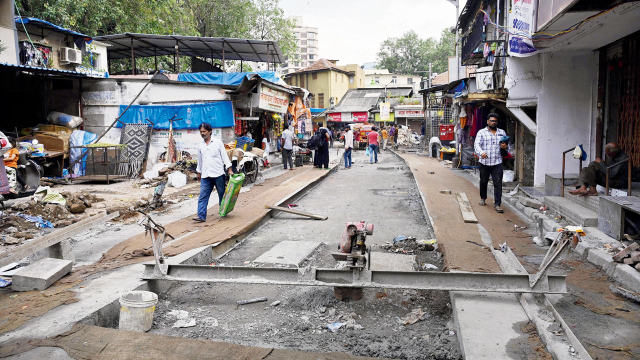 Ongoing roadwork at Kapad Bazar, Mahim West. A 100-metre stretch is still awaiting concrete pouring while another 200 metres remains under curing. Pic/Ashish Raje